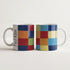 Kubek ceramiczny z nadrukiem obrazu Paul Klee Color Chart QU 1 z 1930 roku przedstawiający kolorowe geometryczne kwadraty