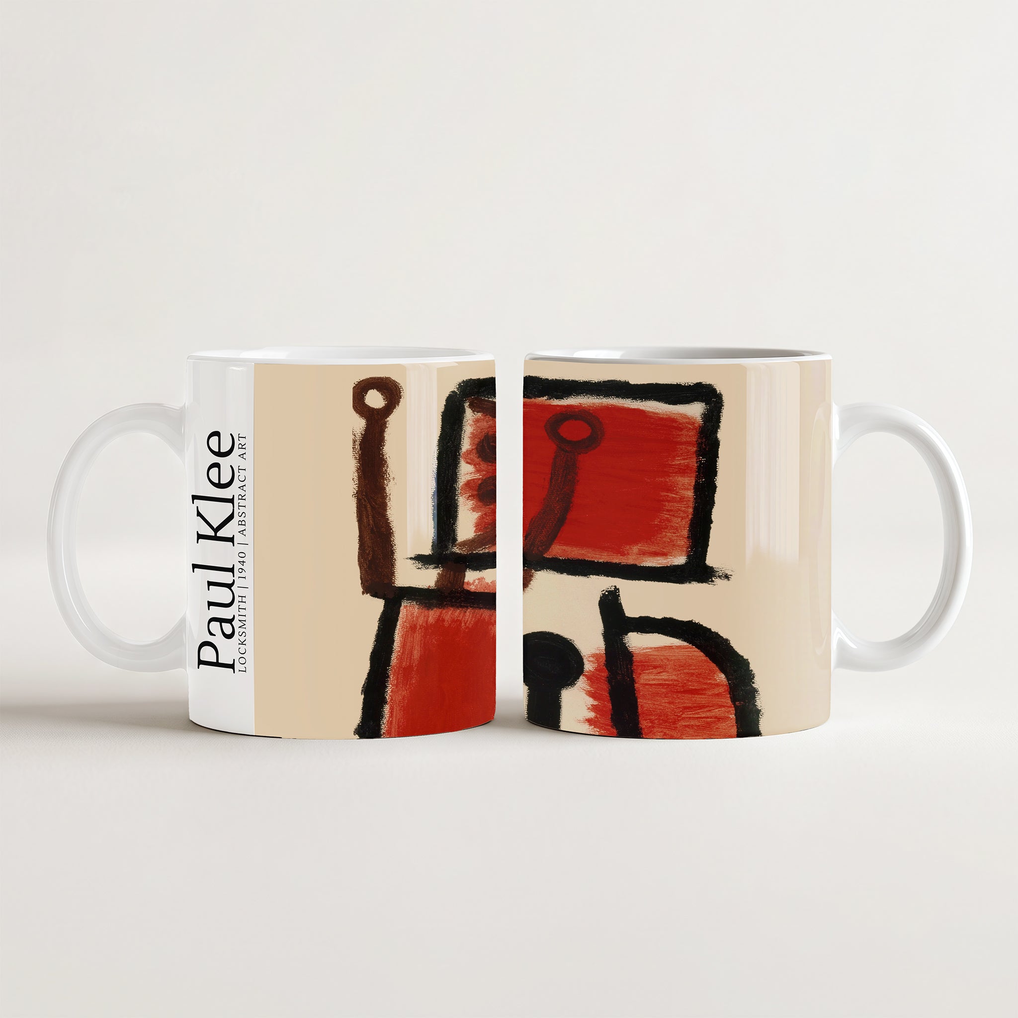 Kubek ceramiczny z nadrukiem obrazu Paul Klee Locksmith 1940 na kremowo-czerwonym tle z napisem Paul Klee