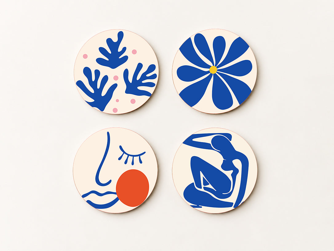 Set of 4 square cork coasters with blue Henri Matisse style cut-out silhouettes and line art on a soft cream background