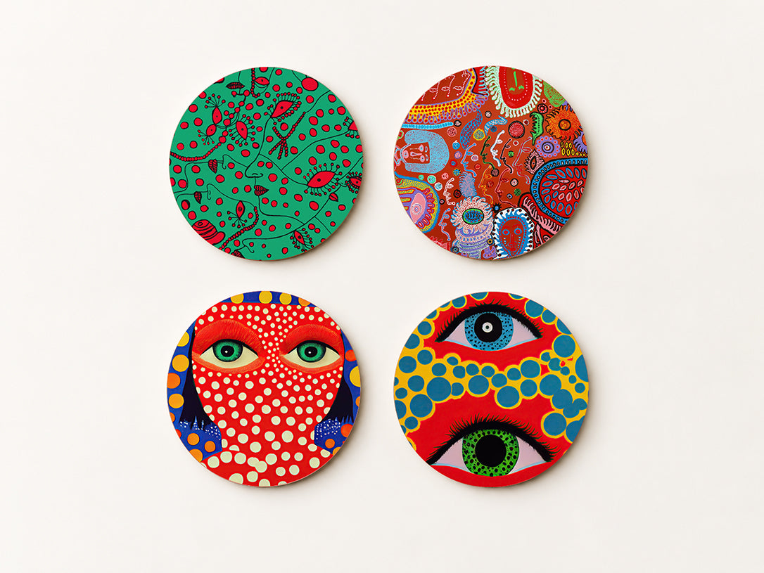 Set of 4 square cork coasters featuring colorful avant-garde polka dot and eye motifs inspired by Yayoi Kusama